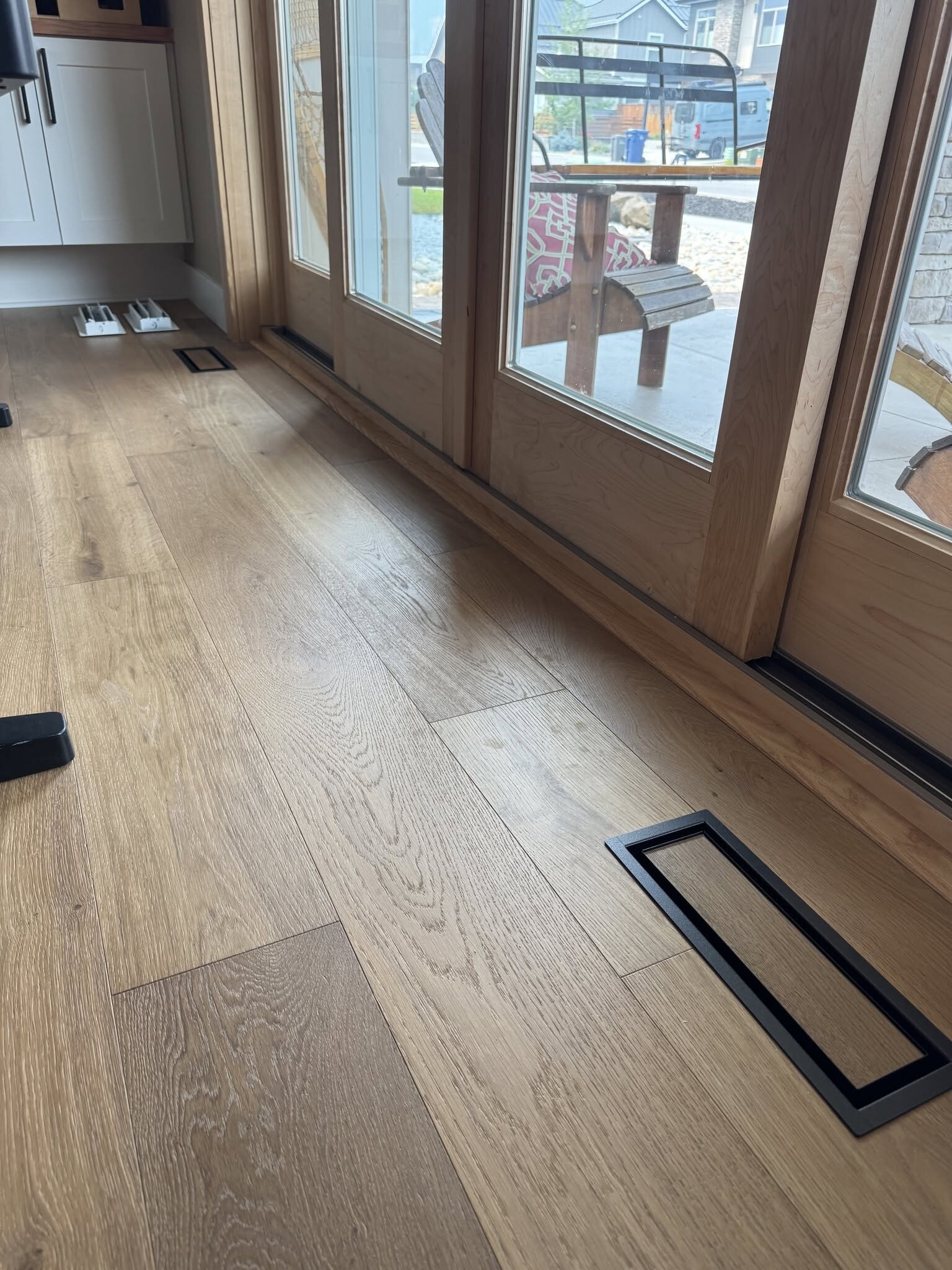 Light wide-plank luxury vinyl flooring installed by MG Flooring