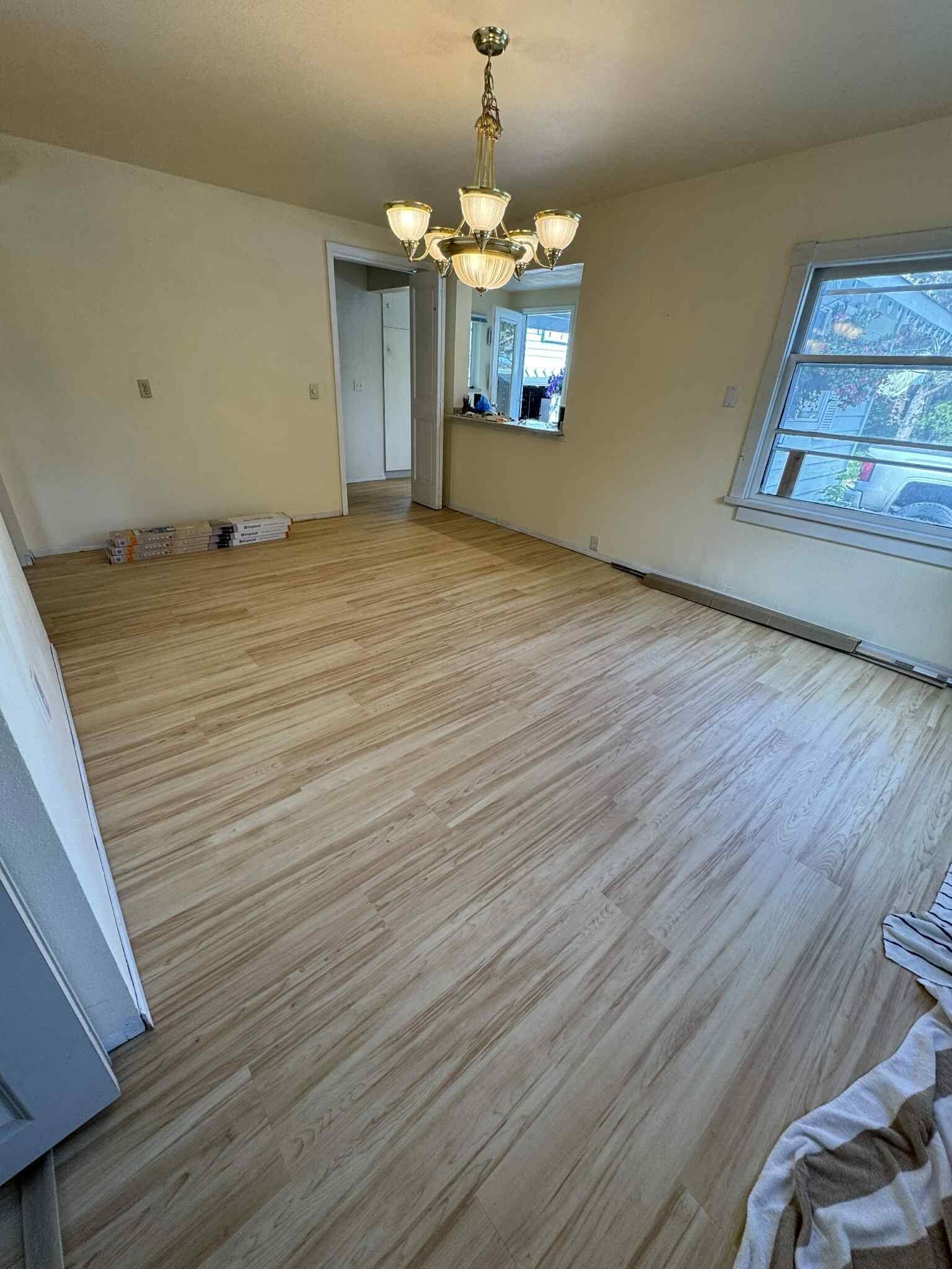 Hardwood dining room floor installed by MG Flooring